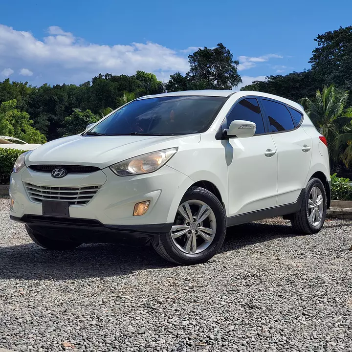 Corotos | Jeepeta Hyundai Tucson 2011 Blanca (Motor Dohc) Magna
