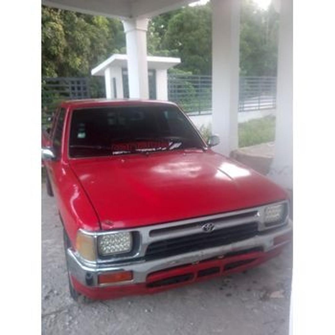 Corotos Toyota Hilux Rojo