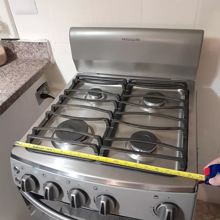 Corotos Estufa de 4 hornillas frigidaire con una bombona de gas de 50